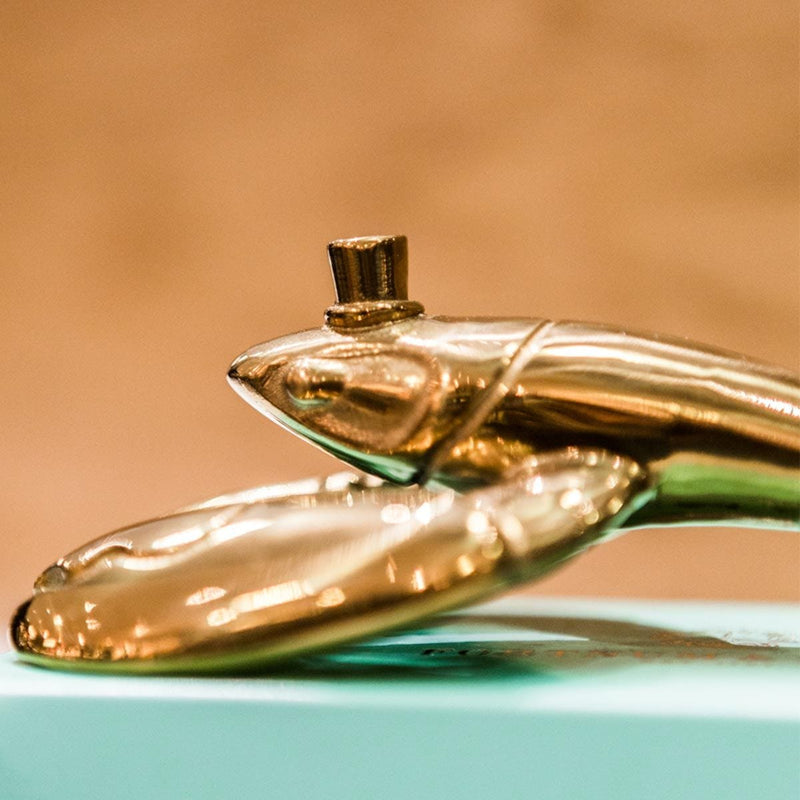 Fortnum's lobster bottle opener in metallic gold with engraved logo - British product