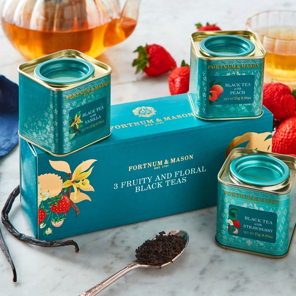 Three 25g mini scented black tea caddies, vanilla, strawberry, peach (British brand)