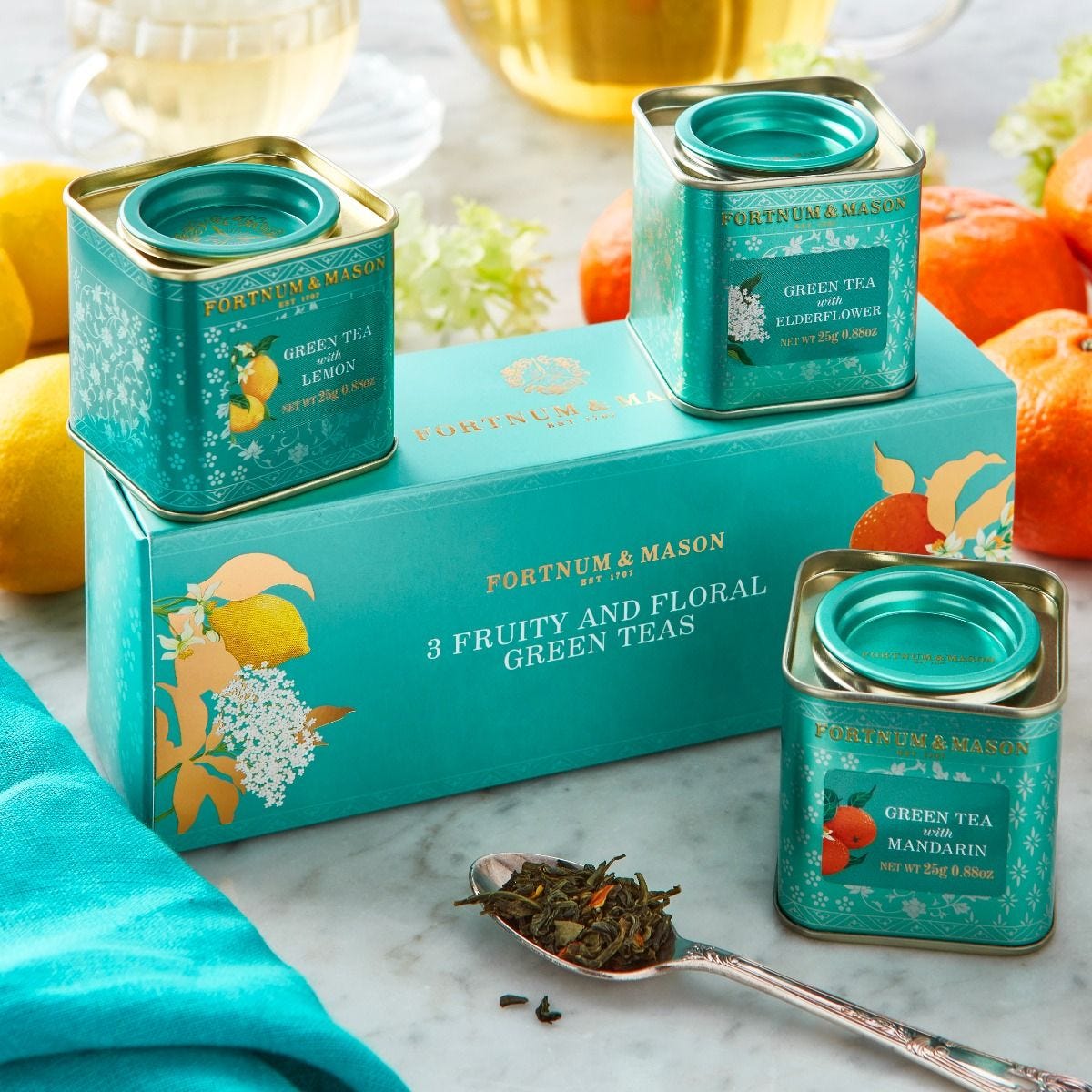 Three mini scented green teas in decorative caddies, UK version