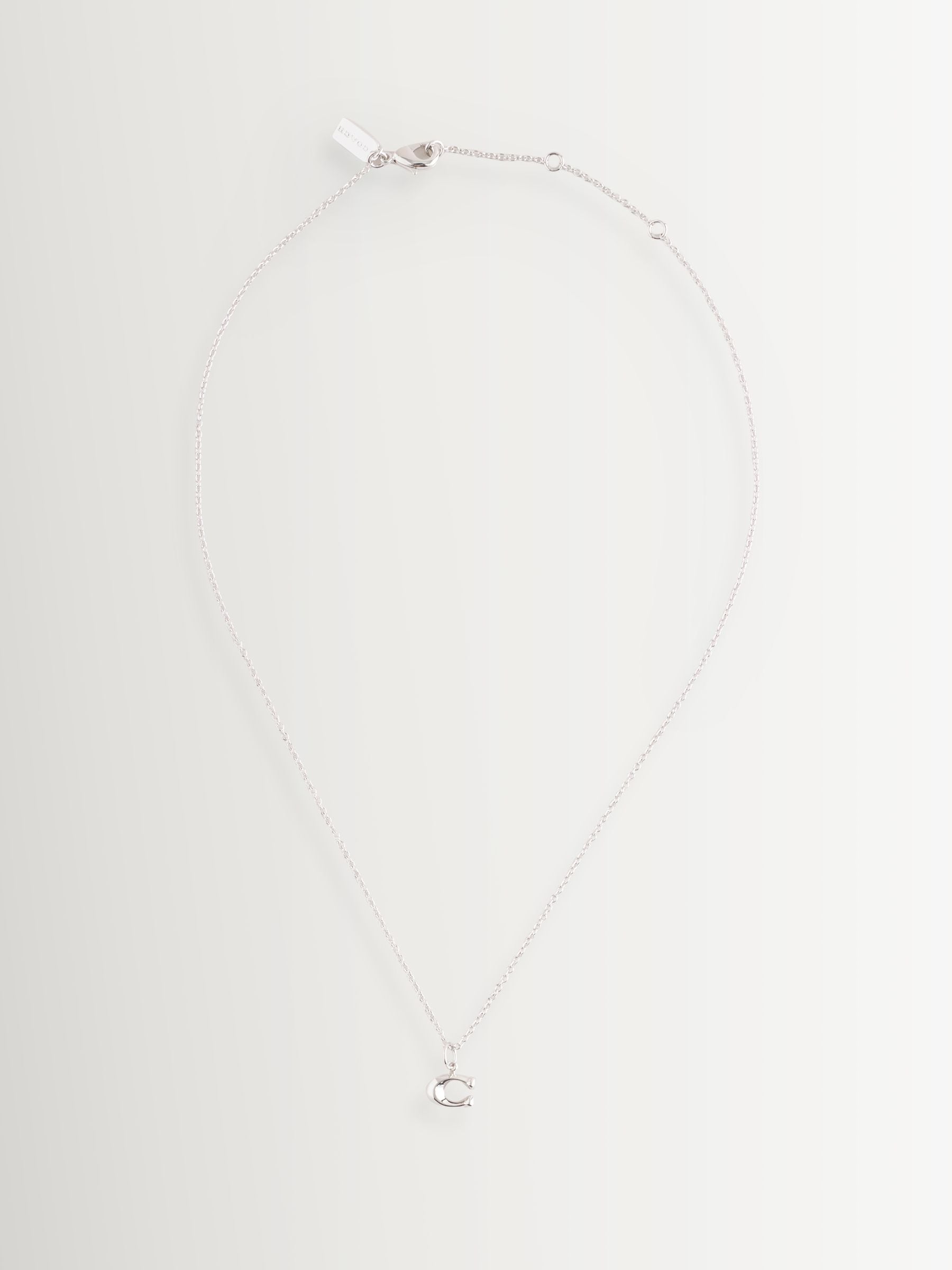 COACH silver tone C starter necklace, imported from the UK
