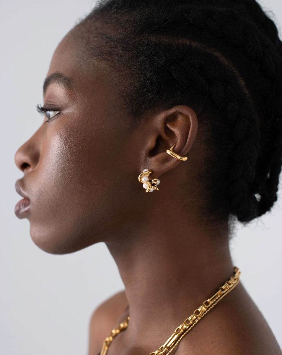 Missoma molten knot pearl hoop earrings in gold, imported from the UK