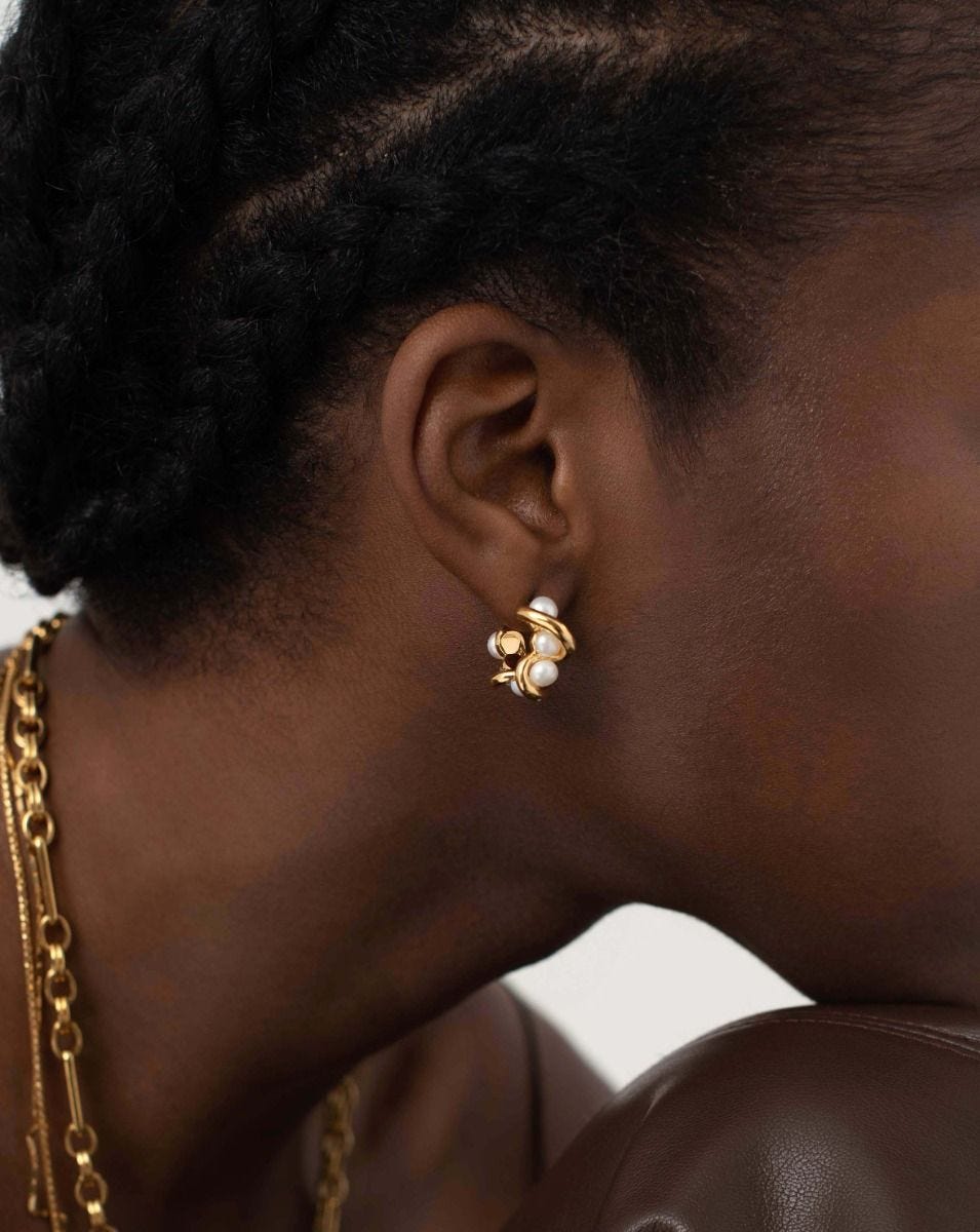 Missoma molten knot pearl hoop earrings in gold, imported from the UK