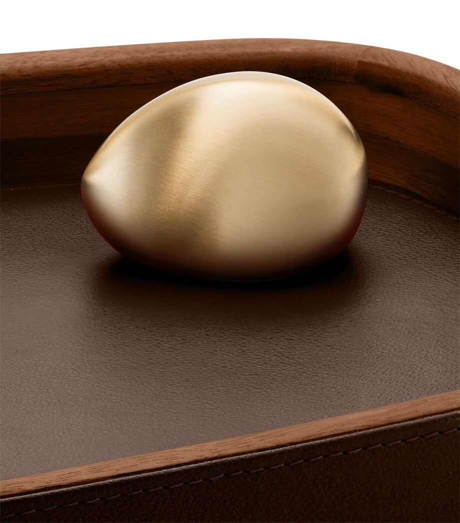 Assouline leather pebble trinket tray with movable brass pebble - British product