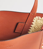 Chloé medium Spin tote bag in raffia and leather, imported from the UK