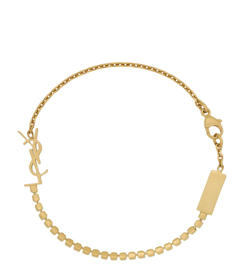Saint Laurent Cassandre embellished bracelet, imported from the UK