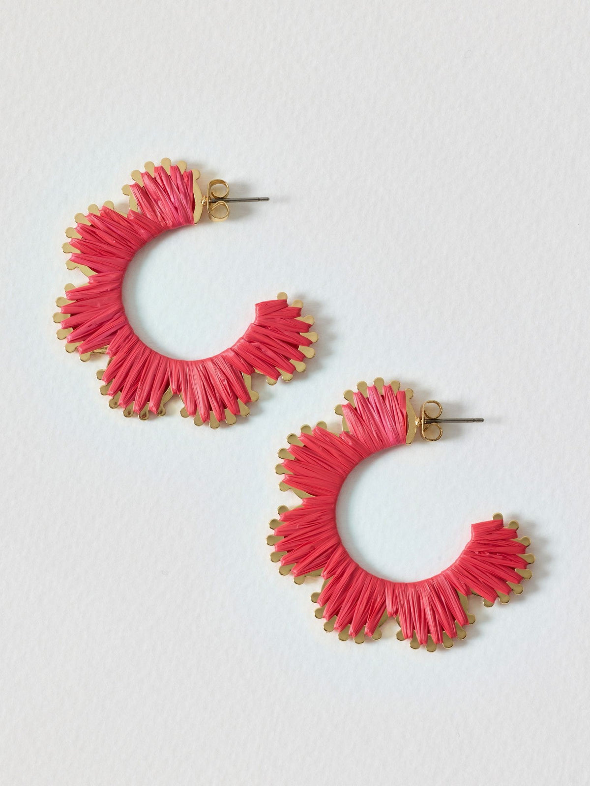 Oliver Bonas pink woven curved edge hoop earrings, imported from the UK