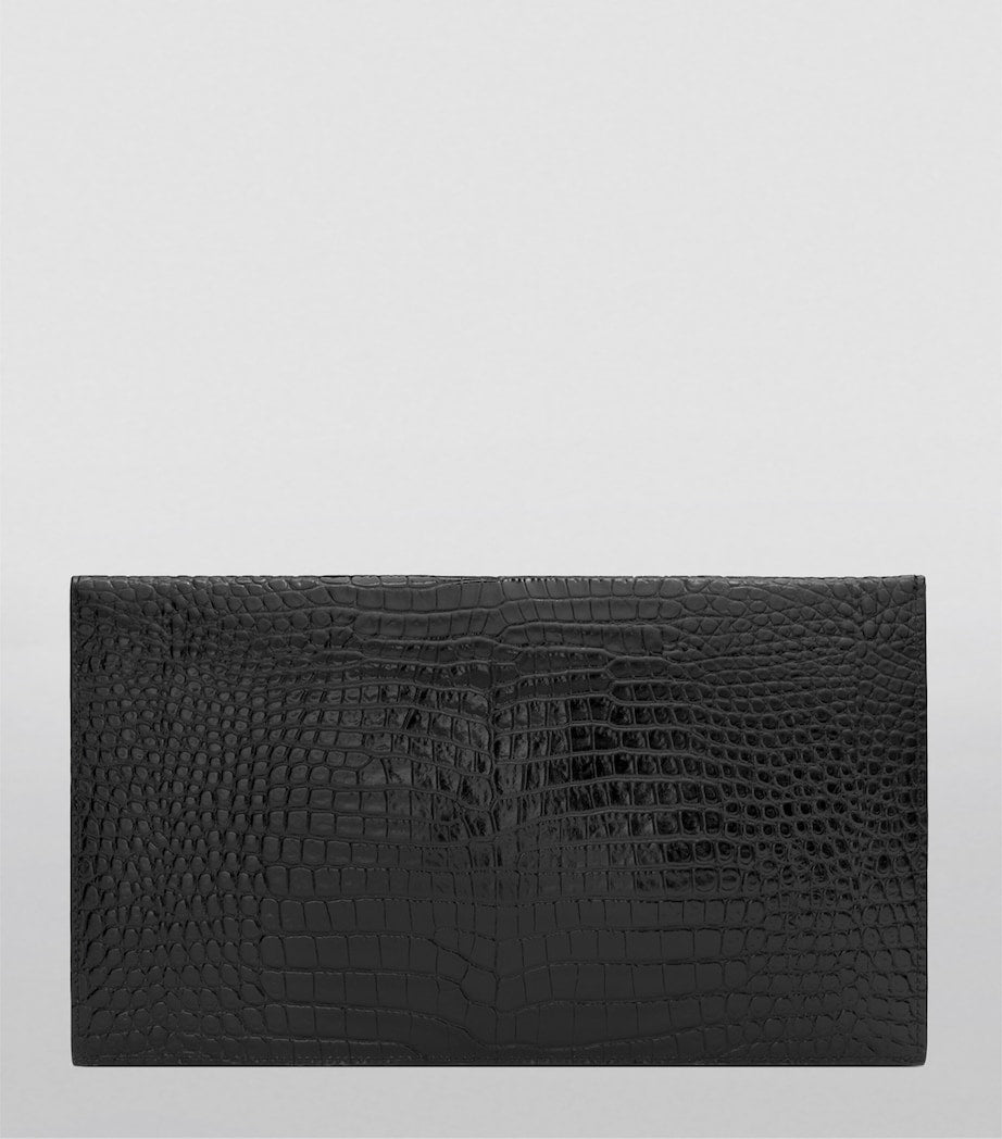 Saint Laurent Uptown croc-embossed leather clutch bag, UK version