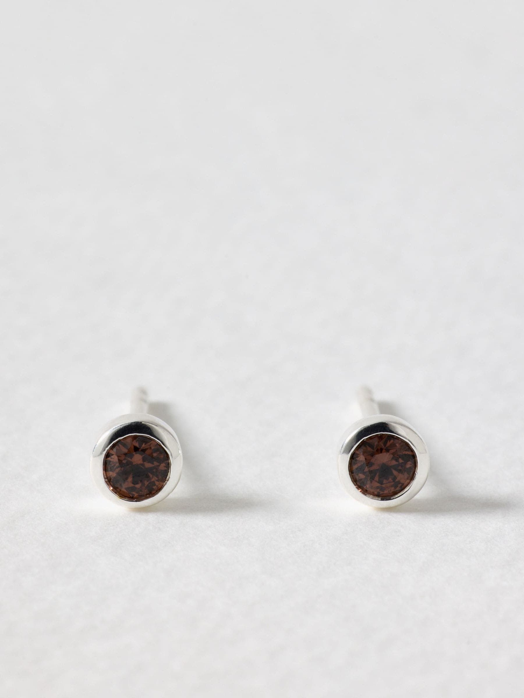 Oliver Bonas brown stone silver stud earrings, UK version