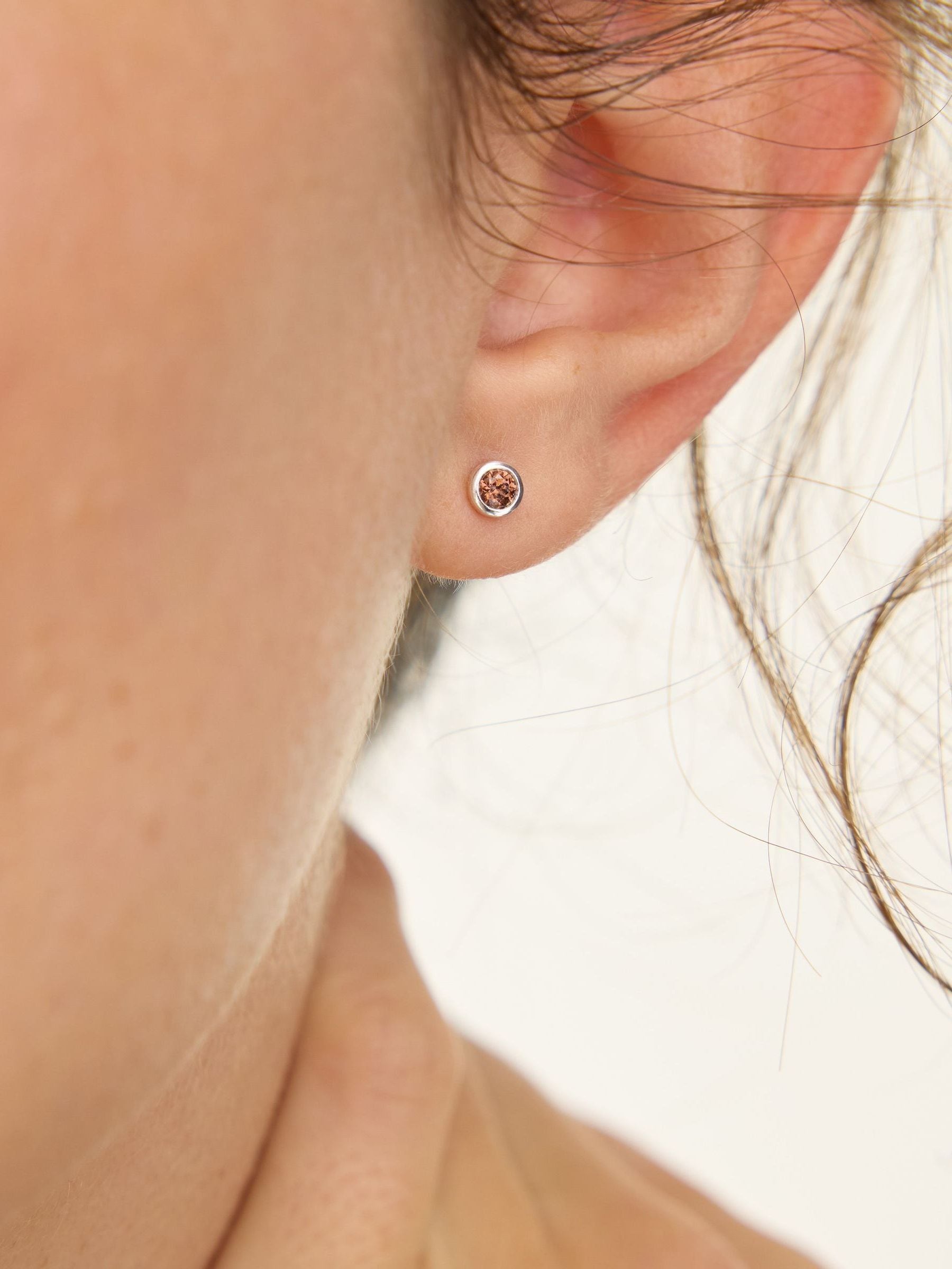 Oliver Bonas brown stone silver stud earrings, UK version