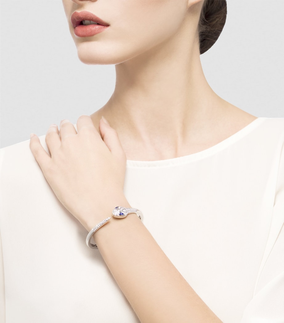 Bvlgari Serpenti bangle white gold diamonds sapphire eyes, imported from the UK