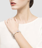 Bvlgari Serpenti bangle white gold diamonds sapphire eyes, imported from the UK
