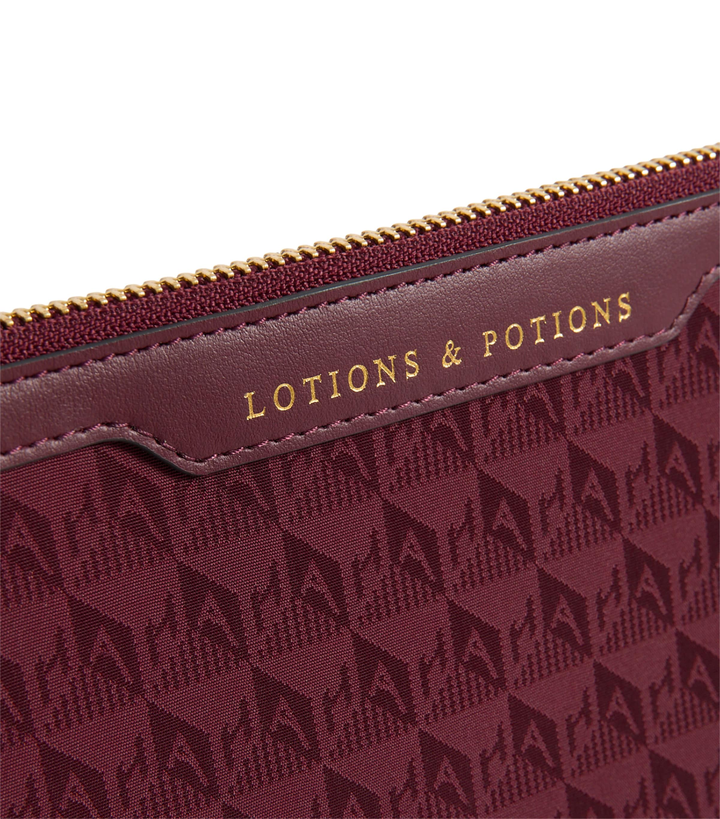 Anya Hindmarch Logo Jacquard Lotions and Potions Toiletry Pouch - British product