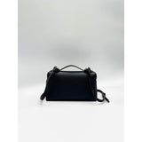 SVNX crossbody satchel in black faux leather (British brand)