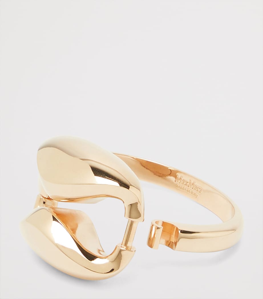 Max Mara oversized geometric bracelet in bronze, UK version