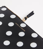 Comme Des Garçons large leather polka-dot zipped pouch, imported from the UK
