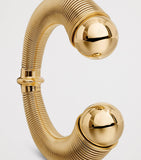 Alaïa spiral cuff gold-tone design with metal beads, UK version