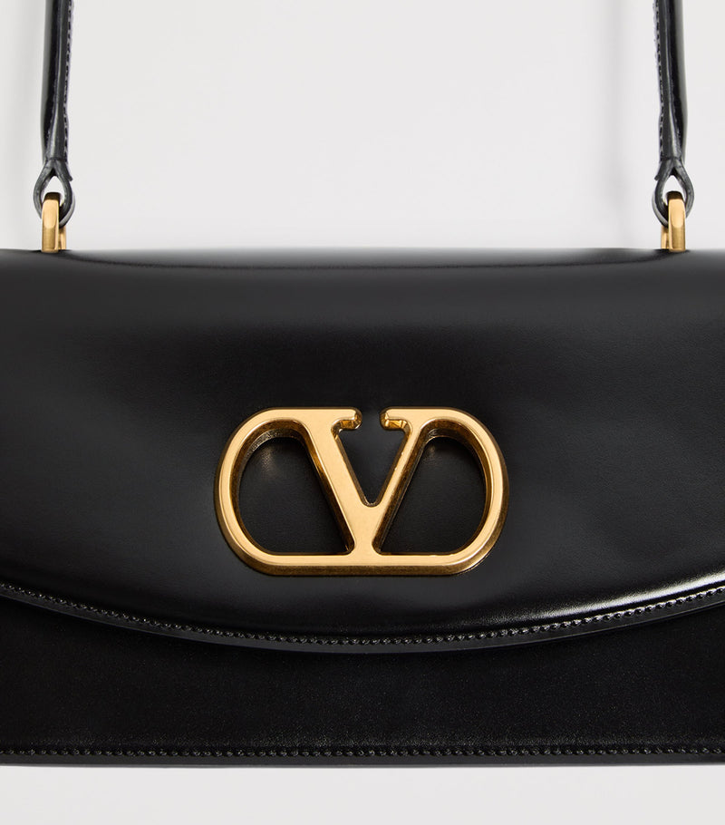 Valentino Garavani Vain top-handle leather bag, imported from the UK