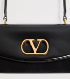 Valentino Garavani Vain top-handle leather bag, imported from the UK