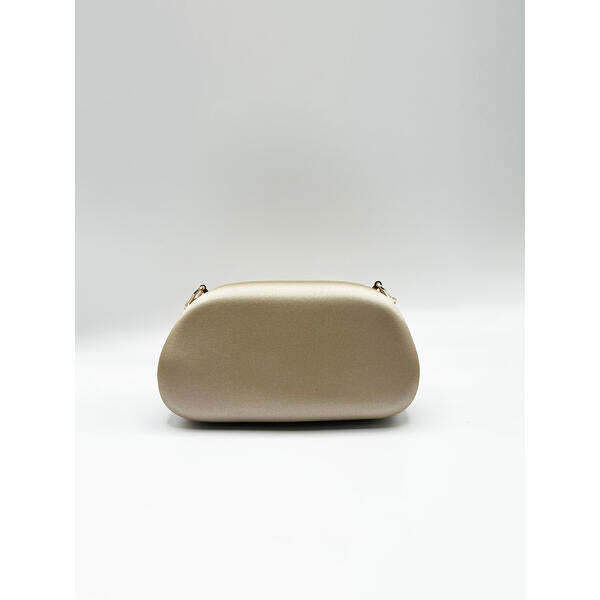 SVNX oval satin clutch bag in muted gold (British brand)