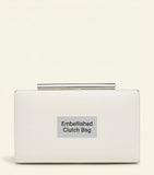 McQueen leather T-Bar box clutch with hand-applied gemstones, imported from the UK