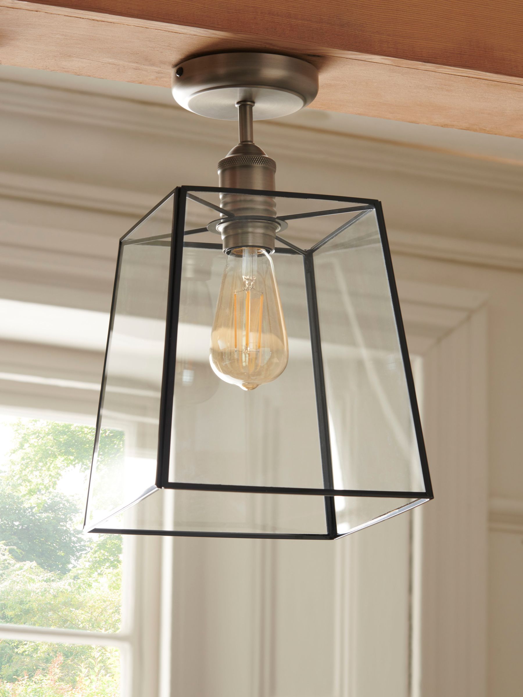 Black Warwick flush ceiling light with glass shade, imported from the UK