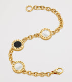 Bvlgari yellow gold mother-of-pearl onyx bracelet (British brand)
