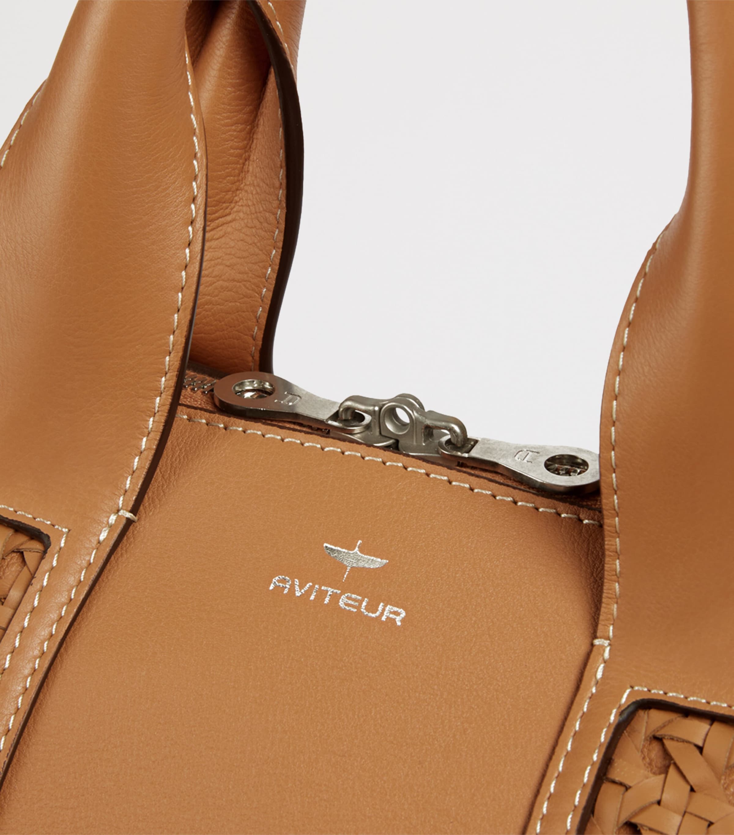 Aviteur leather woven-detail holdall - British product