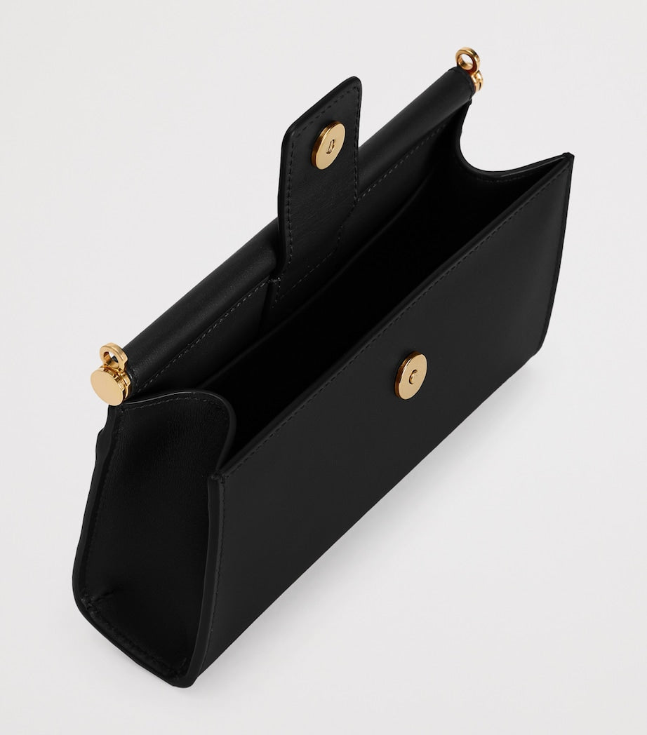 Dolce&Gabbana calfskin leather phone bag with vintage brass hardware - British product