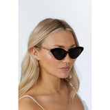 SVNX cat-eye sunglasses black with gold metal, imported from the UK