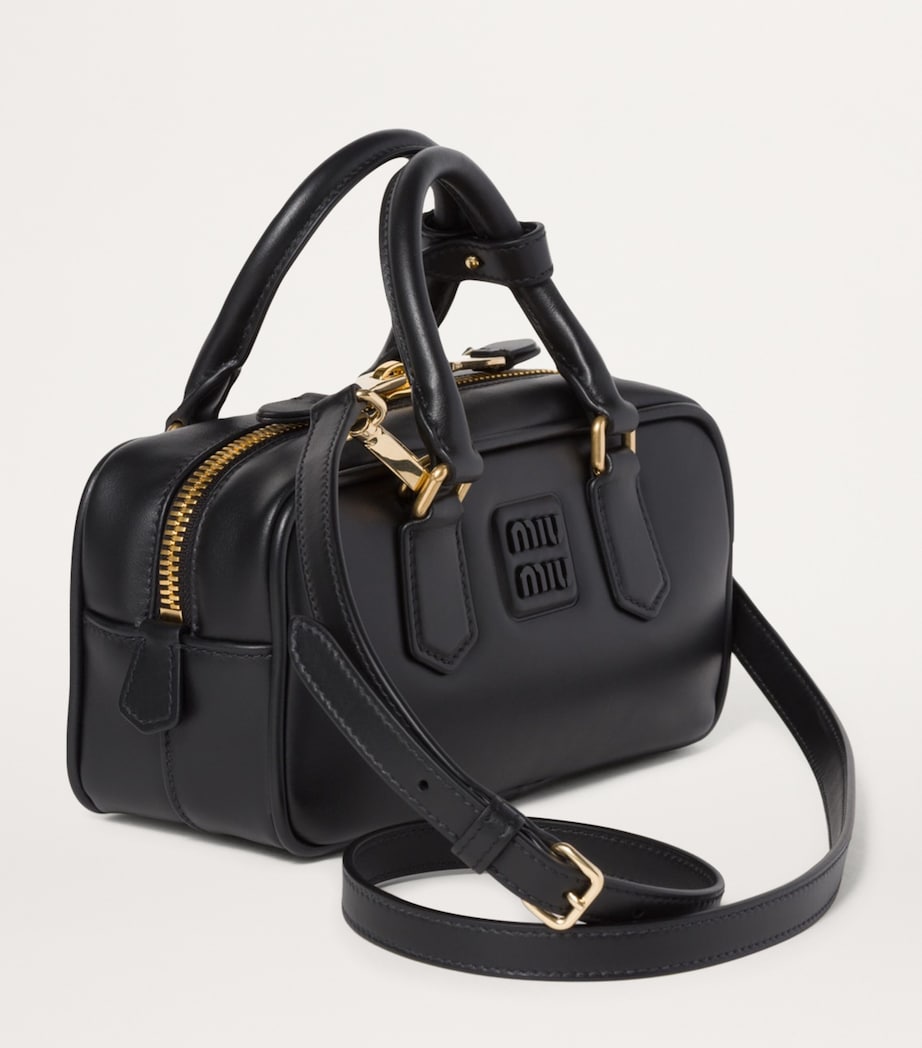 Miu Miu Arcadie top-handle bag in leather, imported from the UK