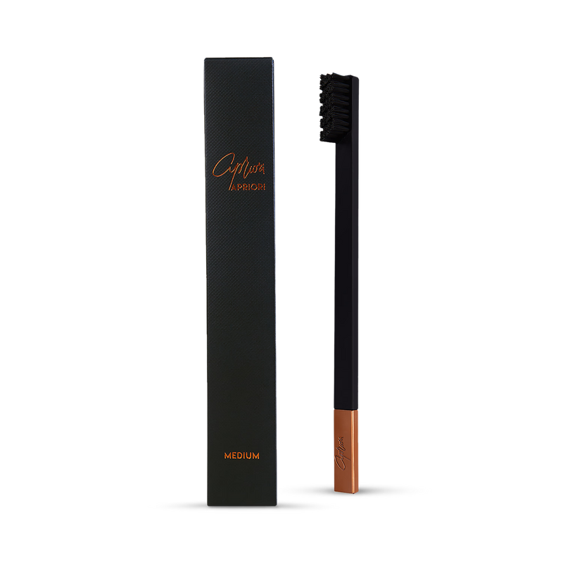 Apriori Copper Noir medium toothbrush with plant-based bristles, imported from the UK