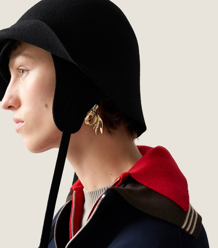 Miu Miu gold-tone metal bow earrings, imported from the UK