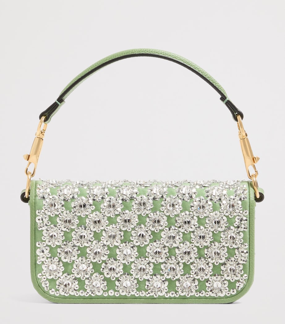 Valentino Garavani small Locò embellished shoulder bag, imported from the UK