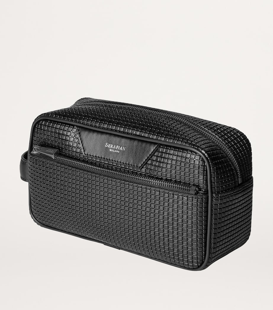 Serapian coated canvas-leather wash bag (British brand)