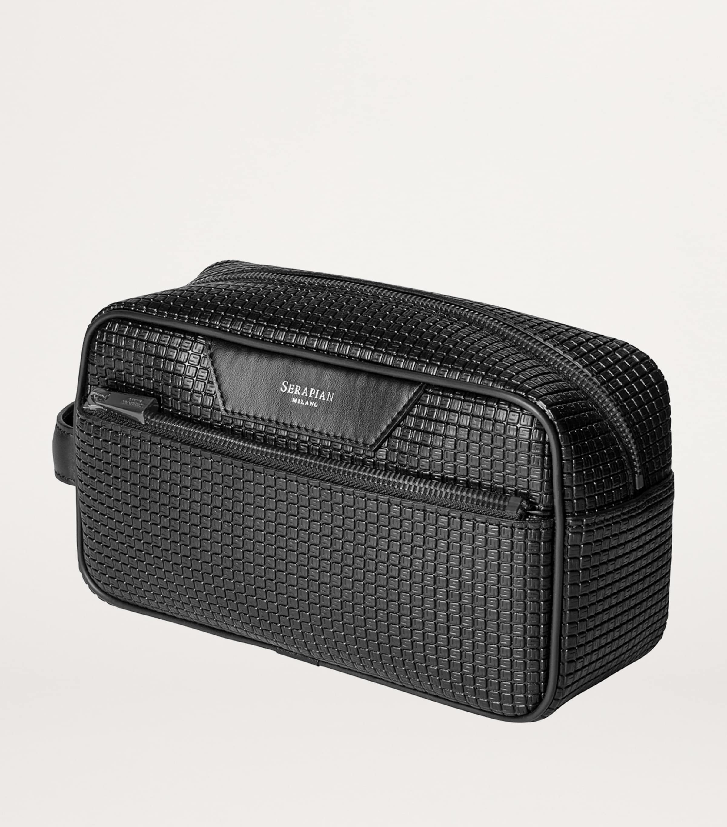 Serapian coated canvas-leather wash bag (British brand)