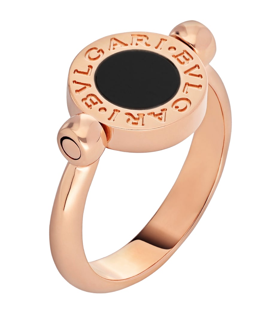 Bvlgari flip ring rose gold mother-of-pearl onyx, imported from the UK