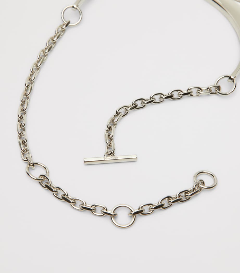 Max Mara crescent necklace metal pendant, imported from the UK