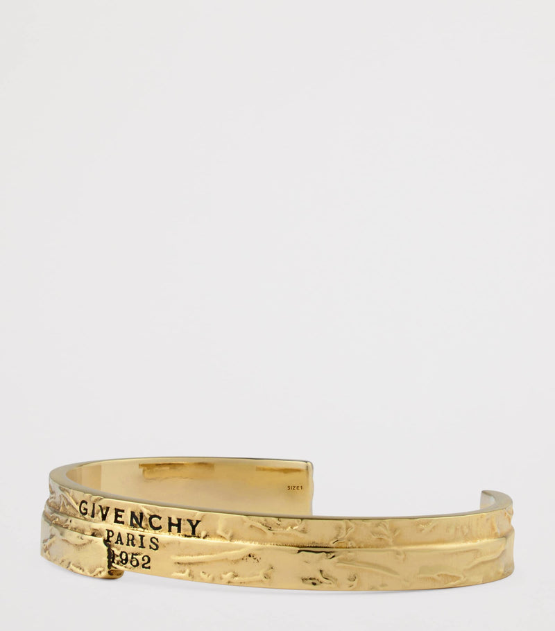 Givenchy gold-tone Tape Cuff Bracelet, imported from the UK