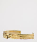 Givenchy gold-tone Tape Cuff Bracelet, imported from the UK