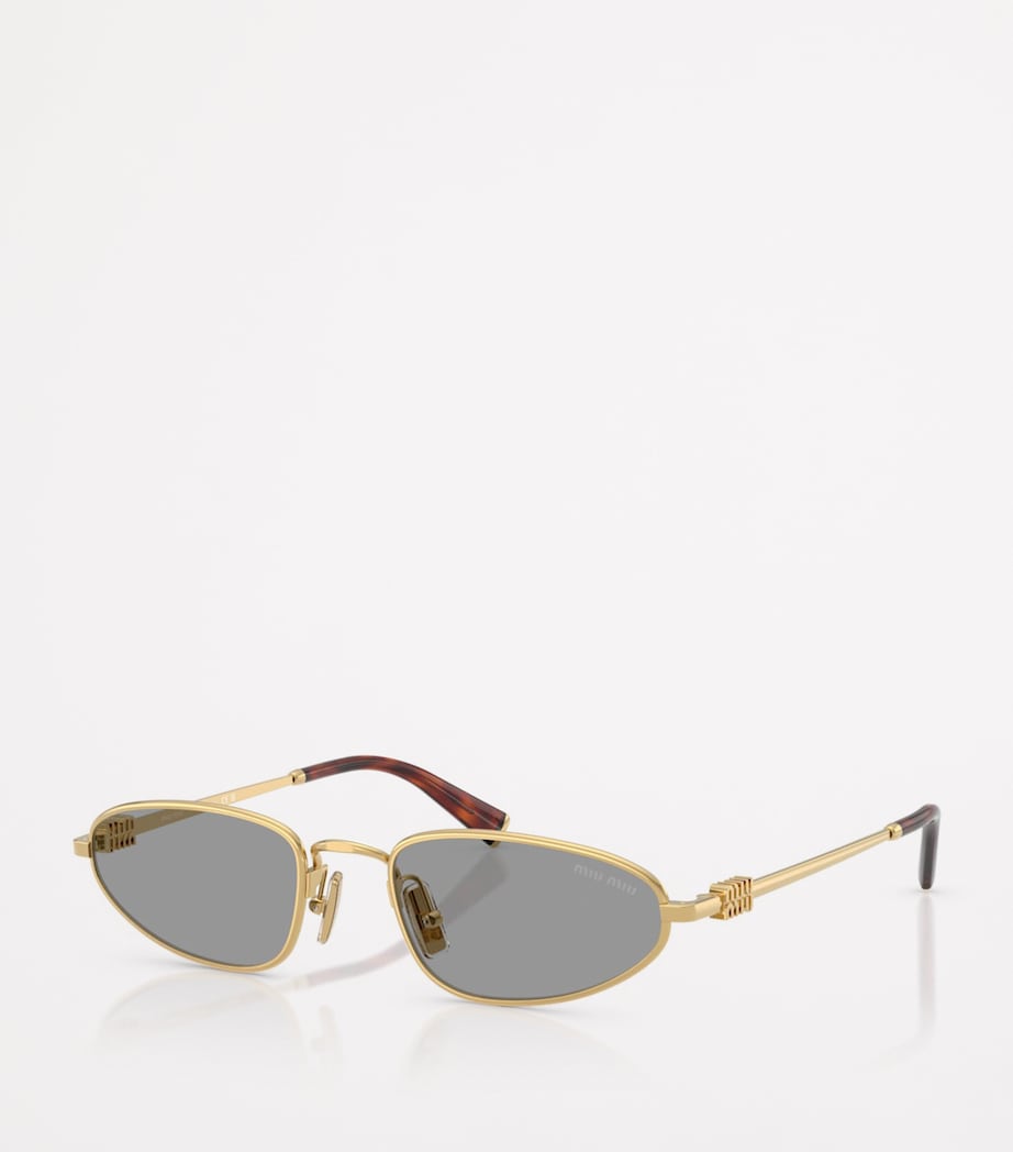 Miu Miu oval sunglasses metal frame - British product