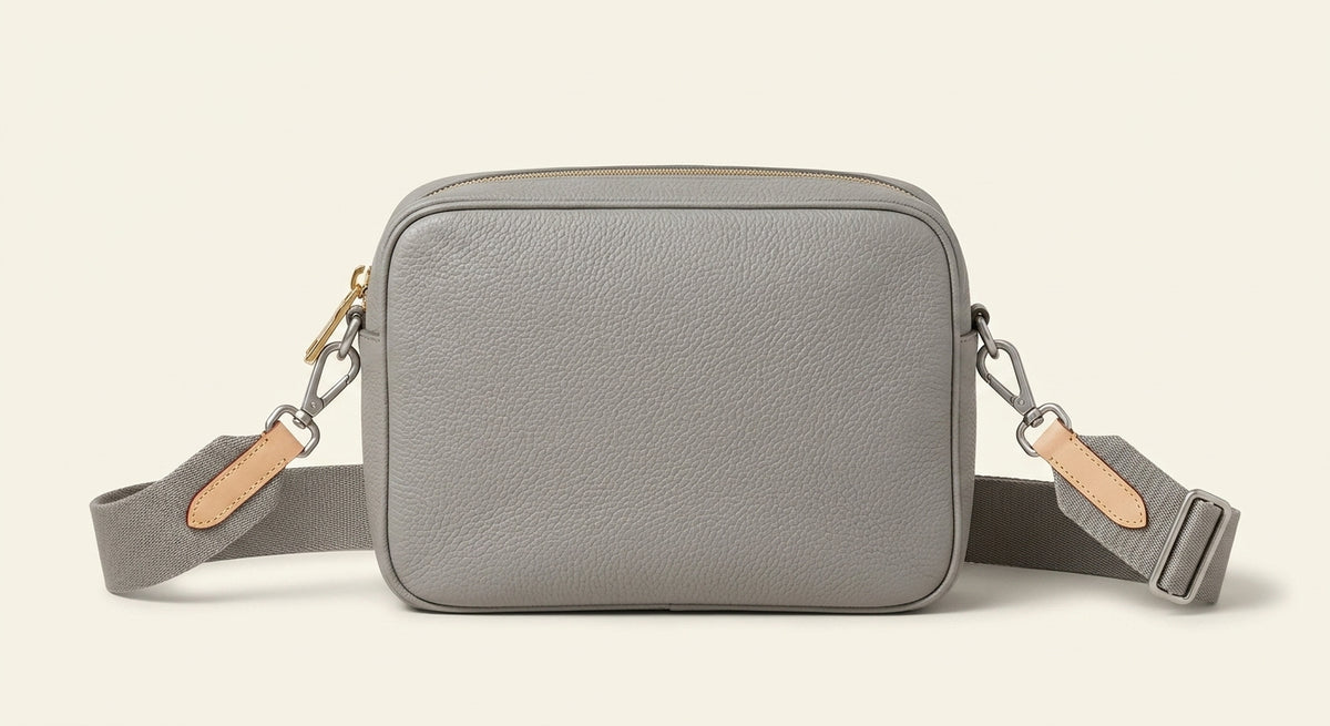 Prada small leather cross-body bag, imported from the UK