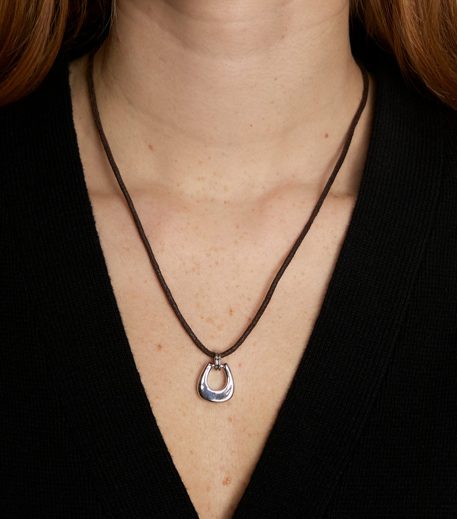 Astrid & Miyu corded rhodium-plated horseshoe pendant necklace, imported from the UK