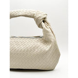 SVNX woven grab bag in unbleached cream with knotted strap (British brand)