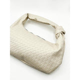 SVNX woven grab bag in unbleached cream with knotted strap (British brand)