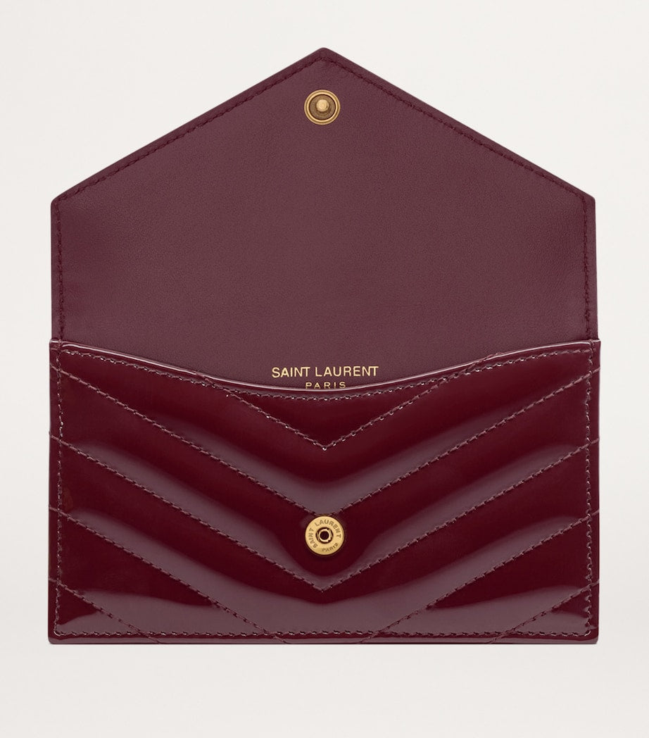 Saint Laurent Cassandre Fragments matelassé purse, UK version