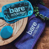 Bare Addiction gift set with toiletry bag, scrubber and headband (British brand)