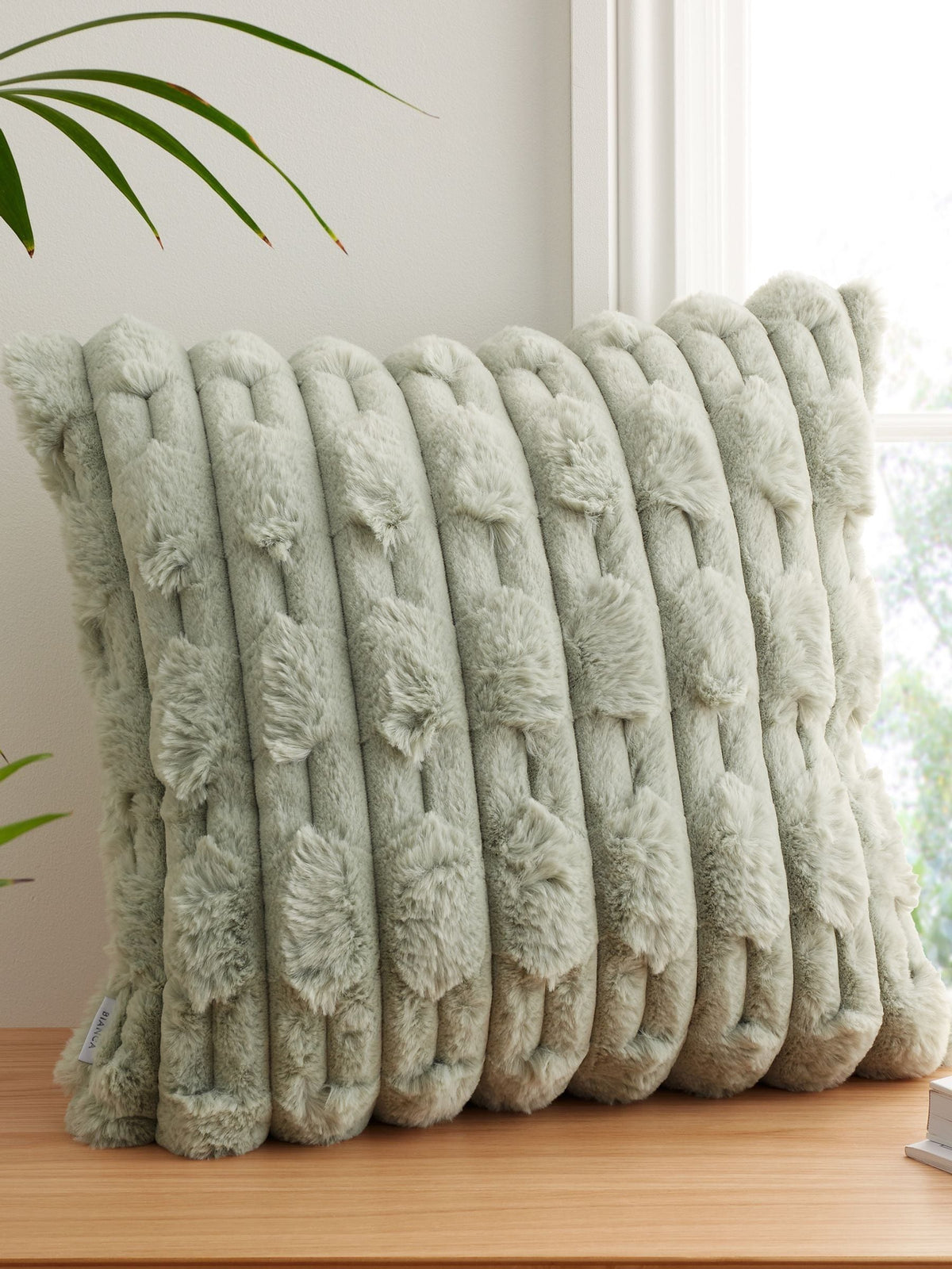 Green carved faux fur cushion 55x55cm - British product
