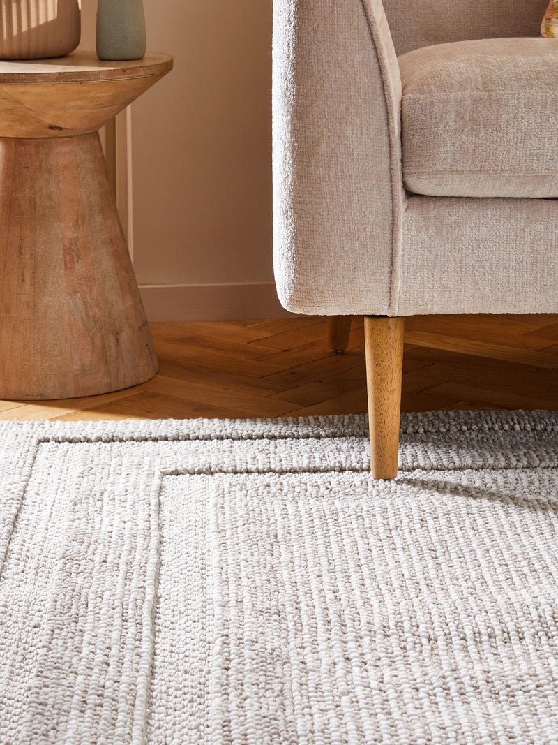 Bobble border rug in natural tones, imported from the UK