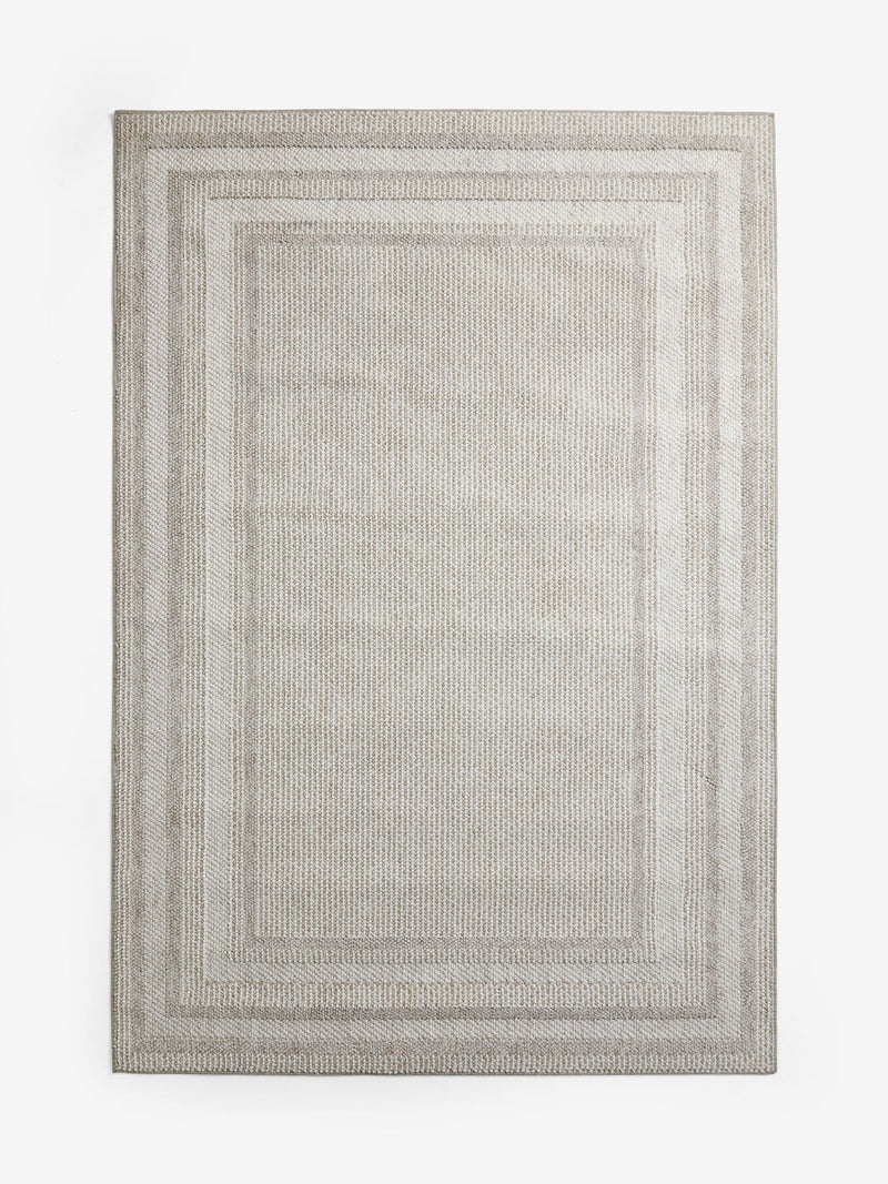 Bobble border rug in natural tones, imported from the UK