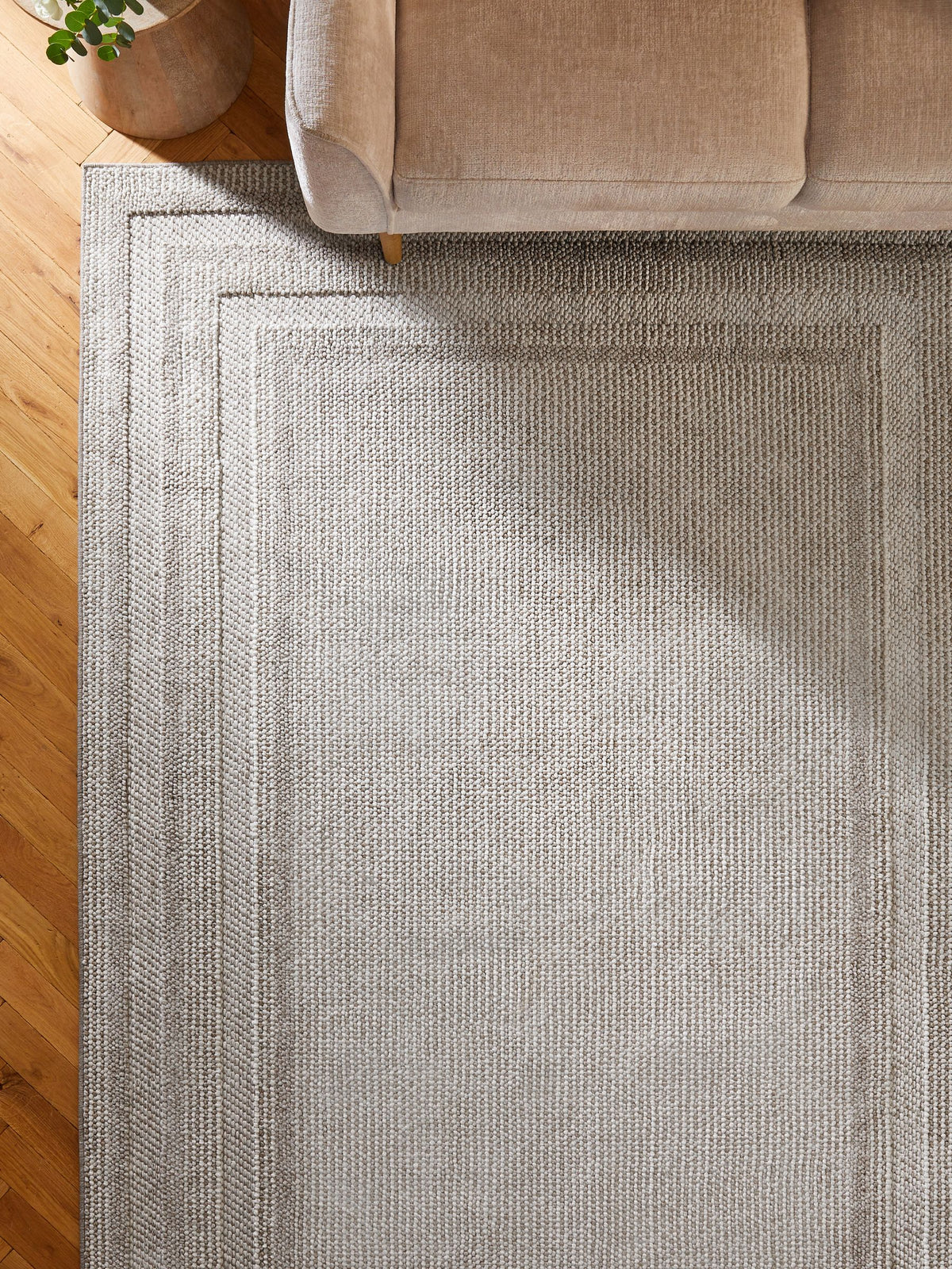 Bobble border rug in natural tones, imported from the UK